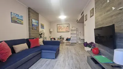 Una televisión o centro de entretenimiento en Apartment Bonito Go2lloret
