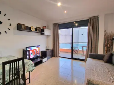 Una televisión o centro de entretenimiento en Apartment Rene Go2llolet