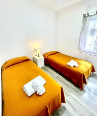 Cama o camas de una habitación en SeaHomes Vacations - HEART OF TOSSA DE MAR