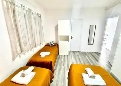 Cama o camas de una habitación en SeaHomes Vacations - HEART OF TOSSA DE MAR