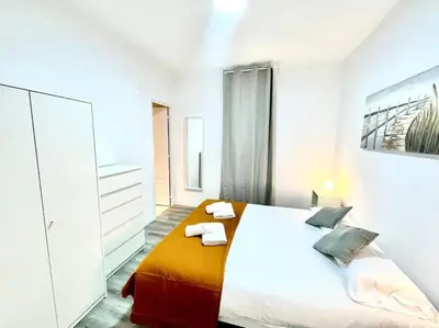 Cama o camas de una habitación en SeaHomes Vacations - CENTRIC APT TOSSA DE MAR