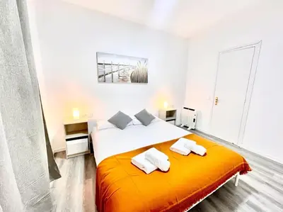 Cama o camas de una habitación en SeaHomes Vacations - CENTRIC APT TOSSA DE MAR