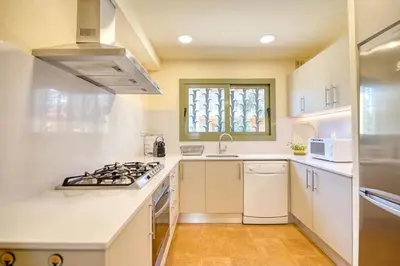 Una cocina o zona de cocina en Villa Martina