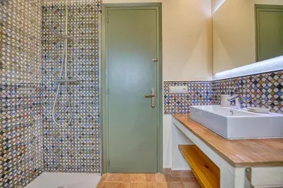 Un baño de Villa Martina