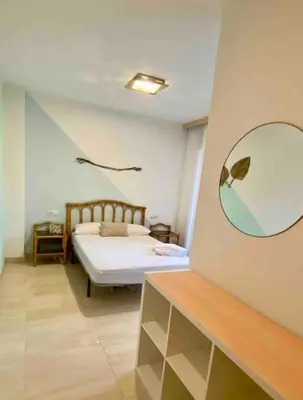Cama o camas de una habitación en Moderno Dúplex