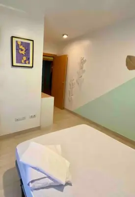 Cama o camas de una habitación en Moderno Dúplex