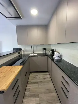 Una cocina o zona de cocina en Céntrico Apartmento