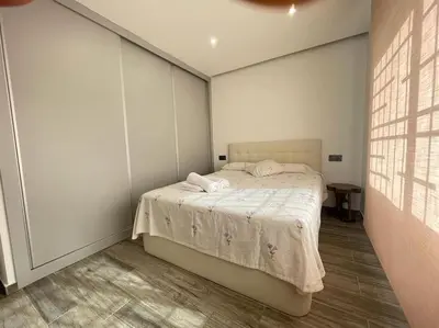 Cama o camas de una habitación en Céntrico Apartmento