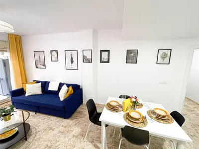 Zona de estar de Yellow Apartment Lloret