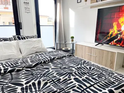 Cama o camas de una habitación en Black Style Apartment