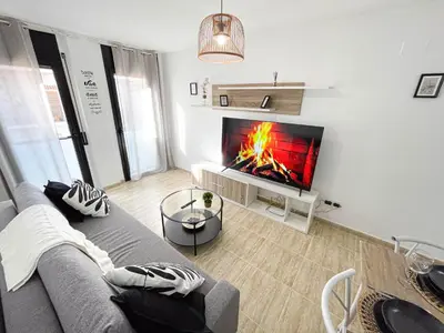 Una televisión o centro de entretenimiento en Black Style Apartment