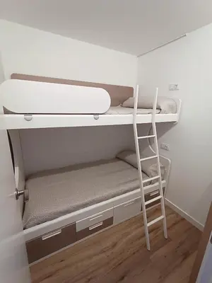 Litera o literas de una habitación en Apartamento nuevo en Calella totalmente reformado con Parking privado