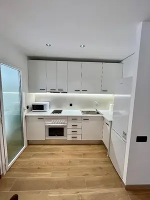 Una cocina o zona de cocina en Encantador apartamento en Lloret de Mar