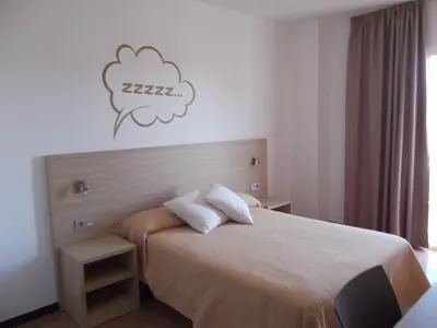 Cama o camas de una habitación en Hotel Mediterrani Express