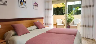 Cama o camas de una habitación en NEXTHOME Terrace & Boulevard City Center