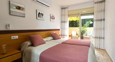 Cama o camas de una habitación en NEXTHOME Terrace & Boulevard City Center
