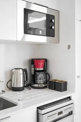 Una cocina o zona de cocina en Beachfront Rooftop Haven studio in Playa de Aro