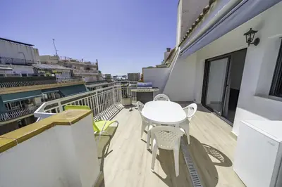Un balcón o terraza de HomeHolidaysRentals Kala - Costa Barcelona