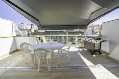 Un balcón o terraza de HomeHolidaysRentals Kala - Costa Barcelona