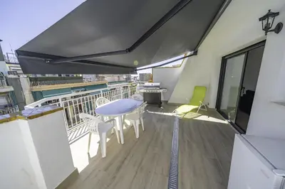 Un balcón o terraza de HomeHolidaysRentals Kala - Costa Barcelona
