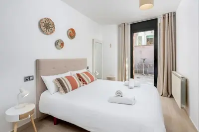 Cama o camas de una habitación en Acogedor apartamento cerca del casco antiguo