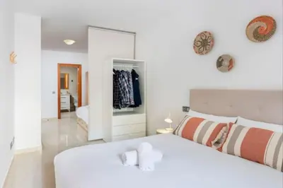 Cama o camas de una habitación en Acogedor apartamento cerca del casco antiguo