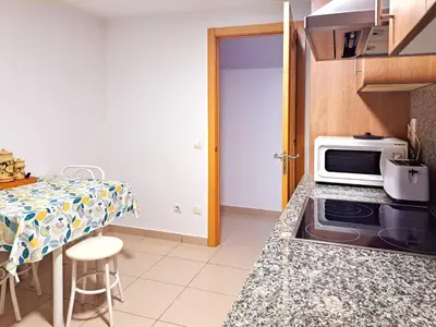 Una cocina o zona de cocina en Apartamento en alquiler turístico en Girona ciudad