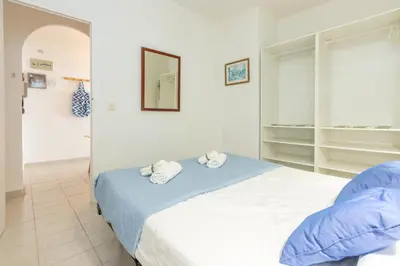 Cama o camas de una habitación en Apartamento en Tossa de Mar a 3 min de la playa