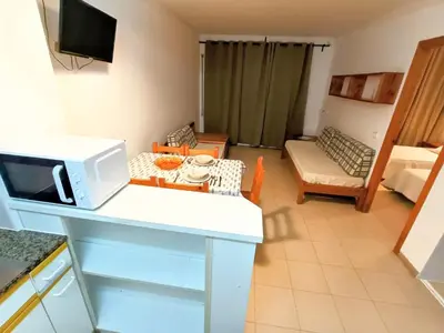 Cama o camas de una habitación en APCOSTAS Els Pins Lotus