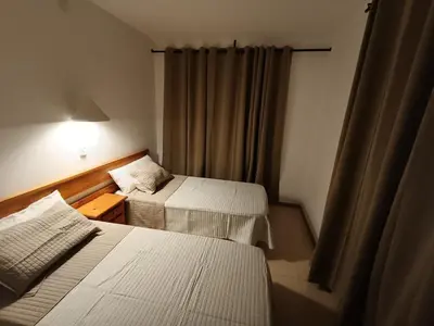 Cama o camas de una habitación en APCOSTAS Els Pins Lotus