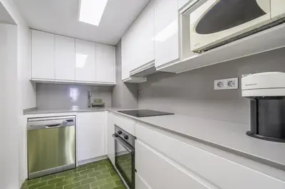 Una cocina o zona de cocina en HomeholidayRentals Singular - Costa Barcelona
