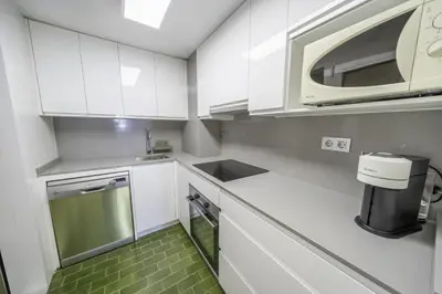 Una cocina o zona de cocina en HomeholidayRentals Singular - Costa Barcelona