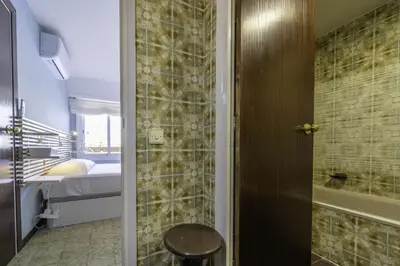 Un baño de HomeholidayRentals Singular - Costa Barcelona