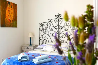Cama o camas de una habitación en La Llar de la Kim, ideal familias