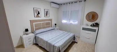 Cama o camas de una habitación en Bravaholidays-602-Lloret Park 2