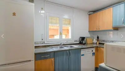 Una cocina o zona de cocina en Bravaholidays-602-Lloret Park 2