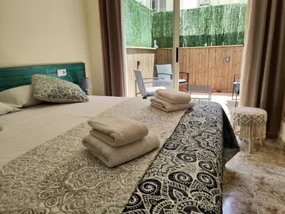 Cama o camas de una habitación en The Astrid Apartment