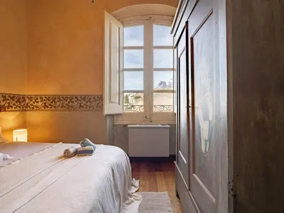 Cama o camas de una habitación en Casa Indiana en el corazón de Begur