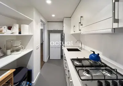 Una cocina o zona de cocina en Athenea B1
