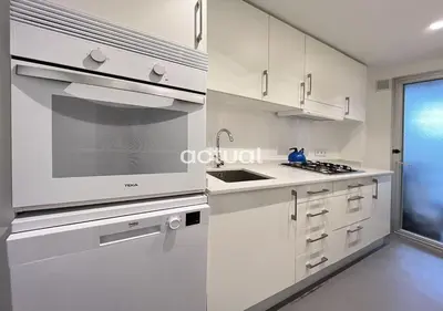 Una cocina o zona de cocina en Athenea B1