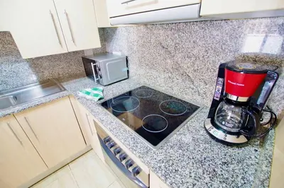 Una cocina o zona de cocina en V&V LLORET- Apartamento Nalu