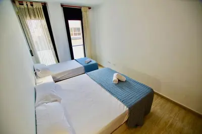 Cama o camas de una habitación en V&V LLORET- Apartamento Nalu