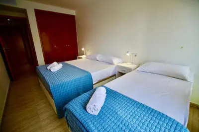 Cama o camas de una habitación en V&V LLORET- Apartamento Nalu