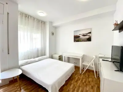 Una televisión o centro de entretenimiento en Apartment Sant Miguel