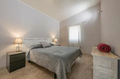 Cama o camas de una habitación en La Vinya - Casa con parking y piscina