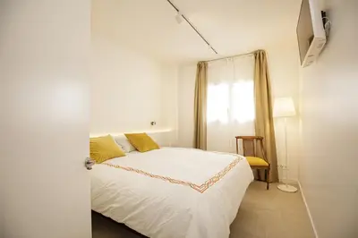Cama o camas de una habitación en Apartamento de tres habitaciones en Girona