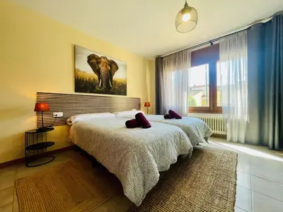 Cama o camas de una habitación en Casa Hermanos by Costabravaway