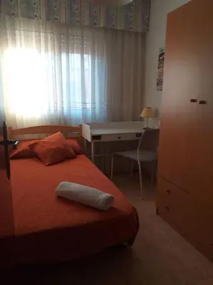 Cama o camas de una habitación en Casa en Malgrat, cerca de la playa