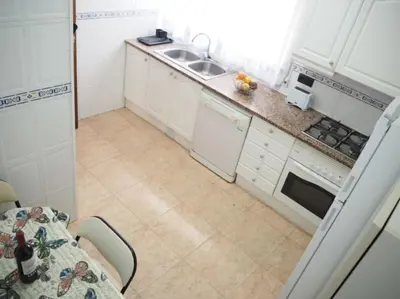 Una cocina o zona de cocina en Casa en Malgrat, cerca de la playa