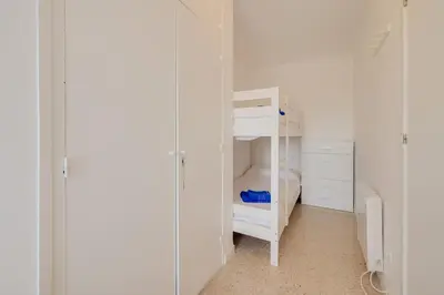 Cama o camas de una habitación en Apartamentos Mediterrani